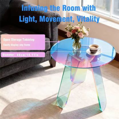 Round iridescent acrylic side table displaying flowers and coffee next to a armchair.
