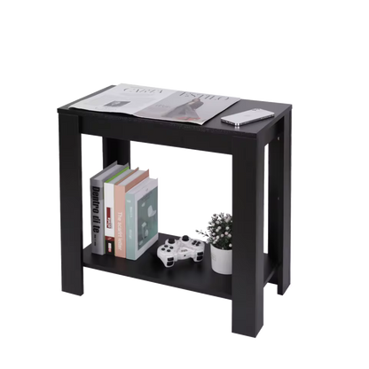 Modern black narrow side table featuring two open storage tiers holding books, a controller, and a small plant.