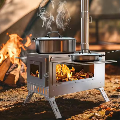 Portable stainless steel wood stove with side glass window, burning fire inside, and cookware on top.
