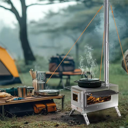 Steaming pot cooking on a stainless steel tent stove with a tall chimney at a campsite outdoors.