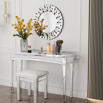 Silver mirrored vanity table set with crushed diamond accents, matching stool, and round mirror.