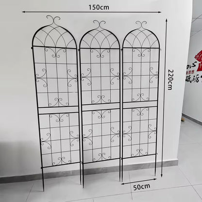 3-pack black metal arched garden trellis panels with measurements against a white wall.