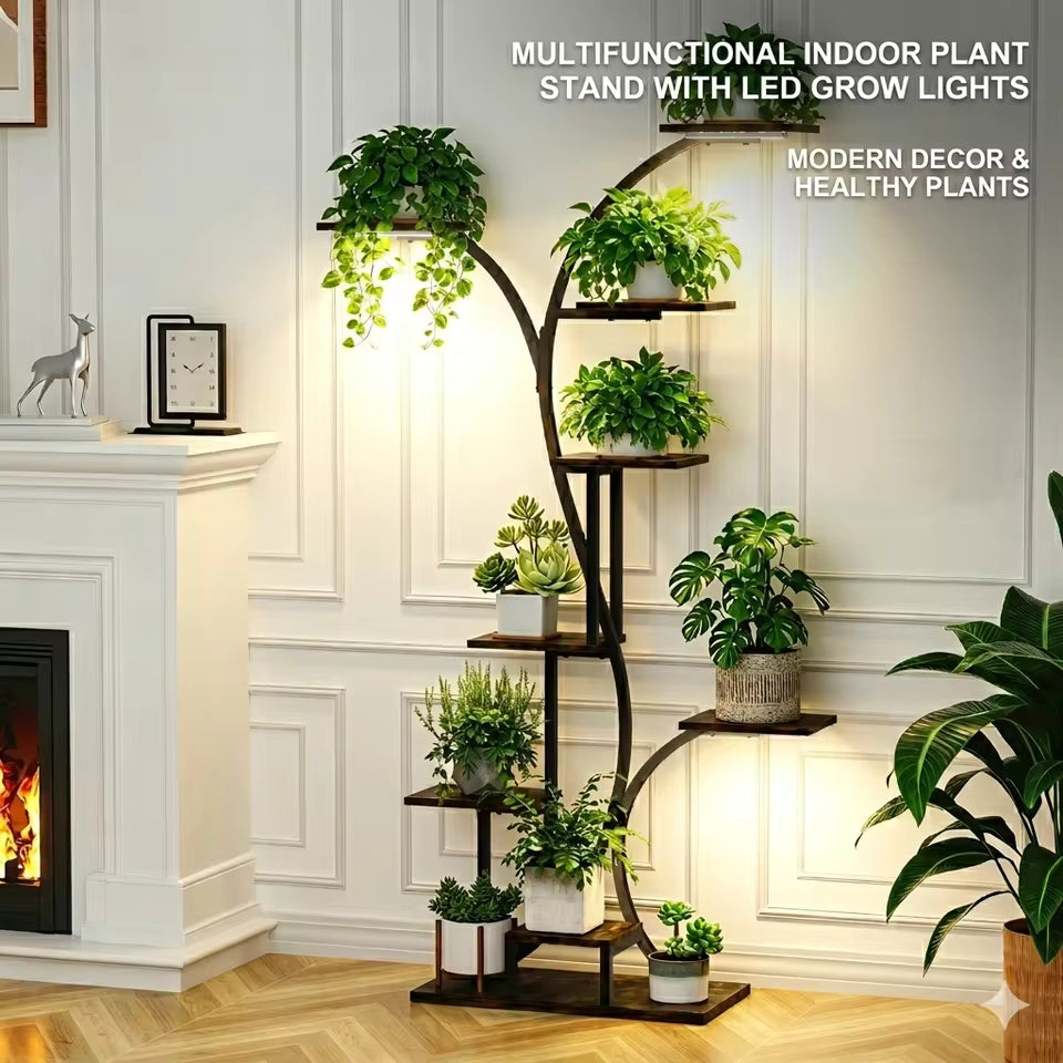Tall multi-tiered plant stand with built-in LED grow lights holding various potted house plants.