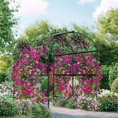 Black metal garden arch trellis covered in vibrant pink flowering vines over a garden path.