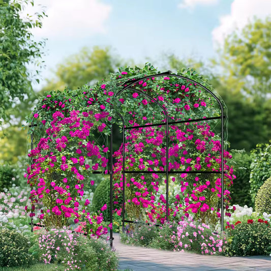 Black metal garden arch trellis covered in vibrant pink flowering vines over a garden path.