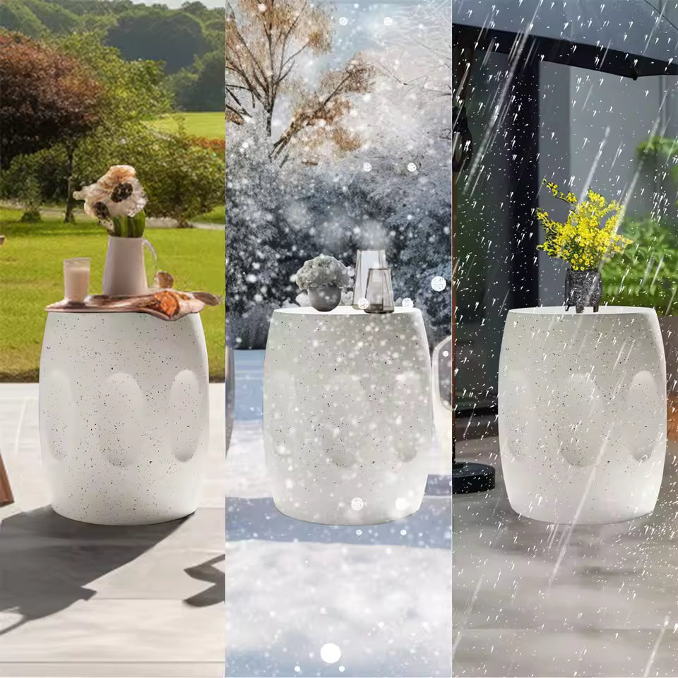 White weather-resistant side table shown outdoors in sunny, snowy, and rainy conditions.